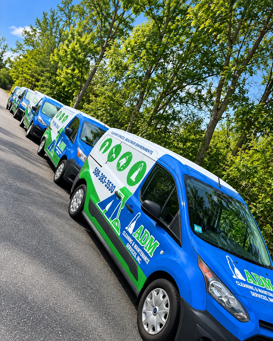 ADM Cleaning and Maintenance Services fleet of branded vans